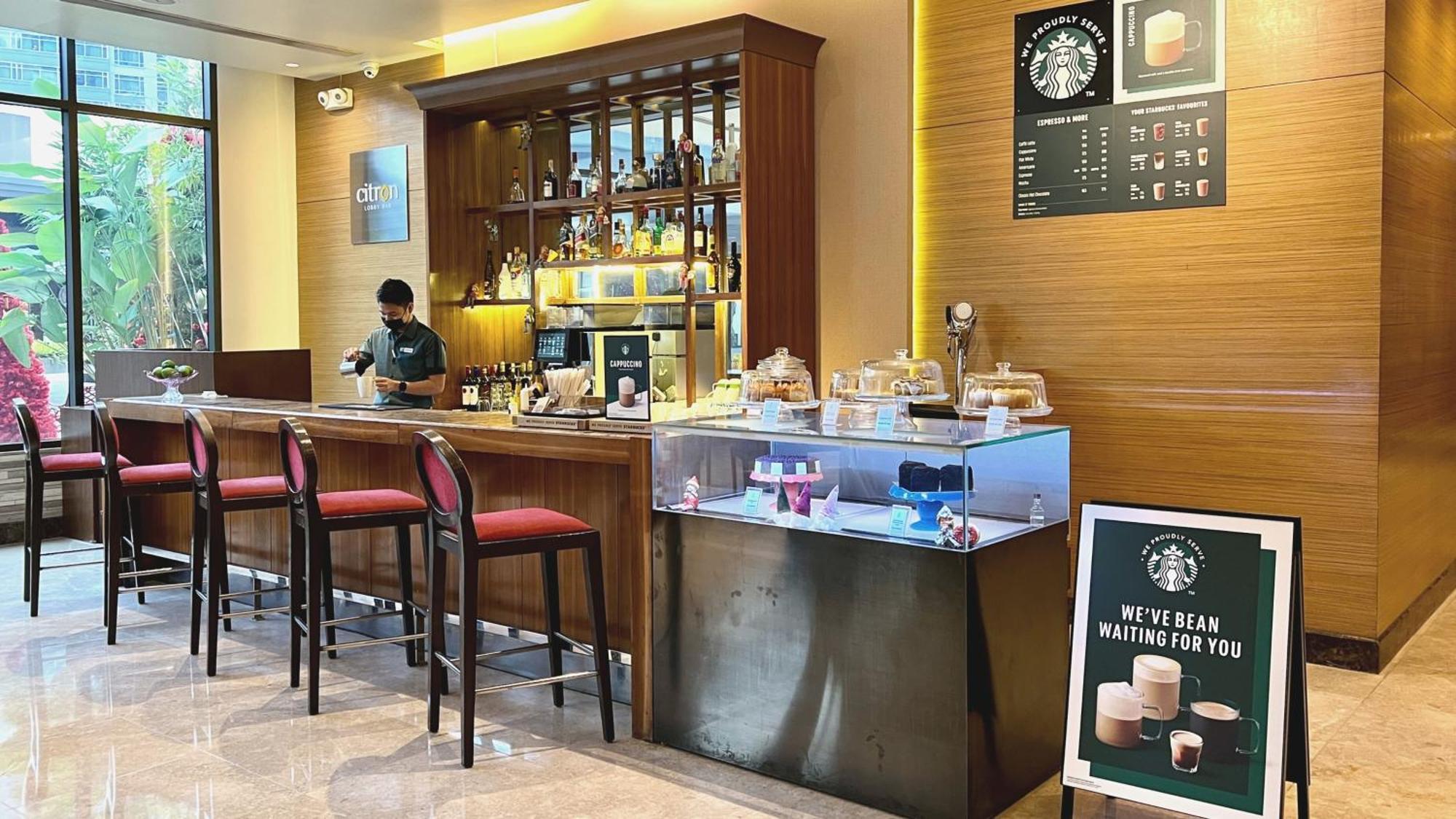 Holiday Inn & Suites Makati By Ihg Makati City Екстер'єр фото Starbucks in Hong Kong